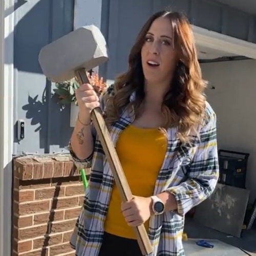 Amber Trucke holding a sledgehammer