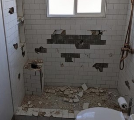 Sledgehammer bathroom destroyed by Colorado contractor