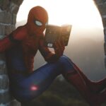 spiderman reading a book