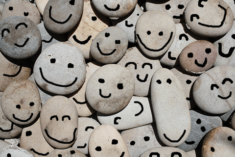 Smiling pebble tiles